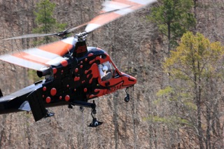 Helicopter flying around powerd by a Whispering Turbines engine.